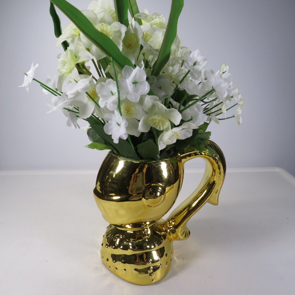 Gold Knight in Shining Armor with White Flowers